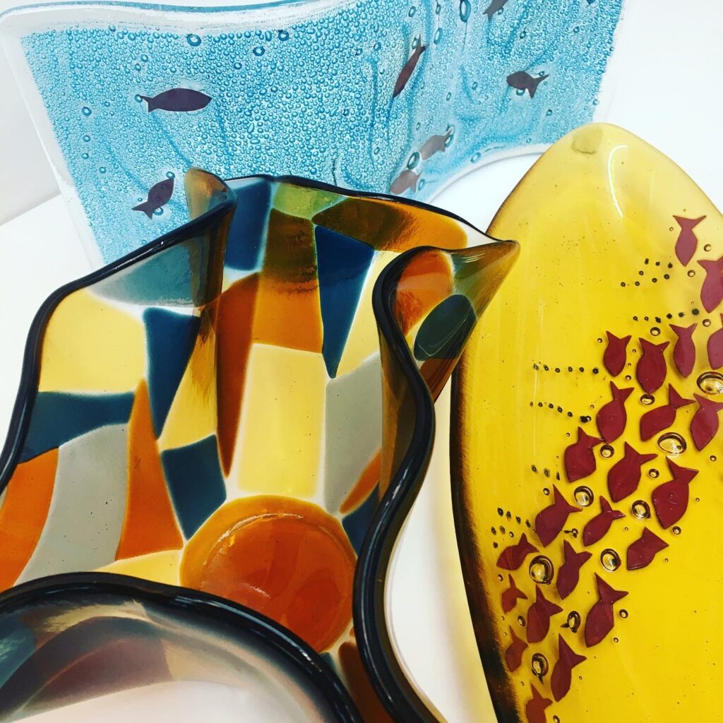 Blues, bubbles and rich ambers combine to made three different fused glass dishes, so many techniques to learn at the Fused Glass Beginners Day Course at Rainbow Glass Studios