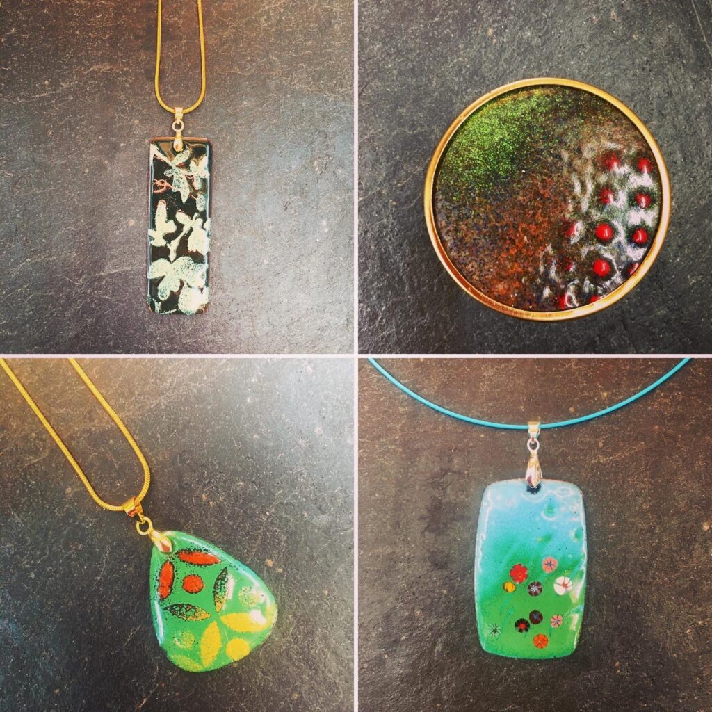 Nature inspired enamelled jewellery made by students on the Enamelling on Copper for Jewellery Day Course at Rainbow Glass Studios