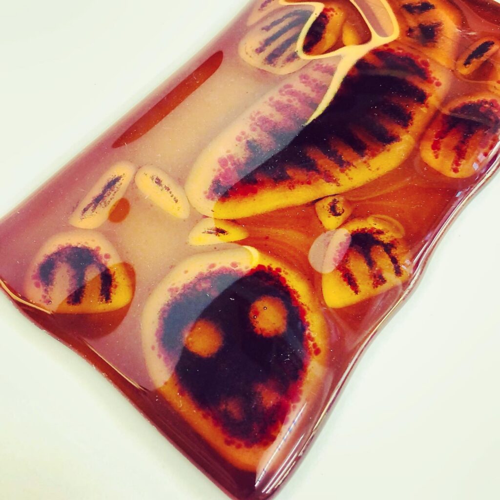 A fused glass fossilised lizard made by a very creative student on our day course for beginners at Rainbow Glass Studios - scary!