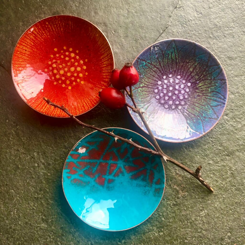 Three enamelled bowls made by Eleanor Watson for the Rainbow Glass Studios for the enamelled copper bowls day course