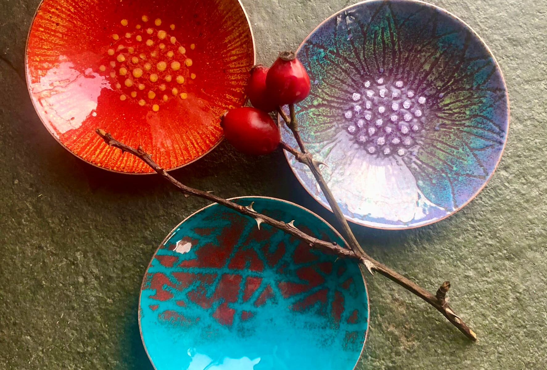 Three enamelled bowls made by Eleanor Watson for the Rainbow Glass Studios for the enamelled copper bowls day course
